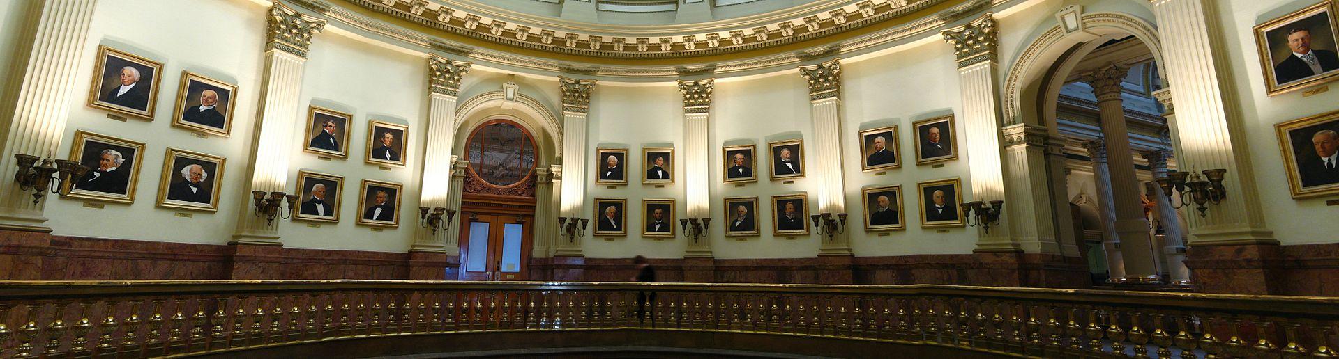 Twenty two portraits of presidents are seen hanging in the Capitol 